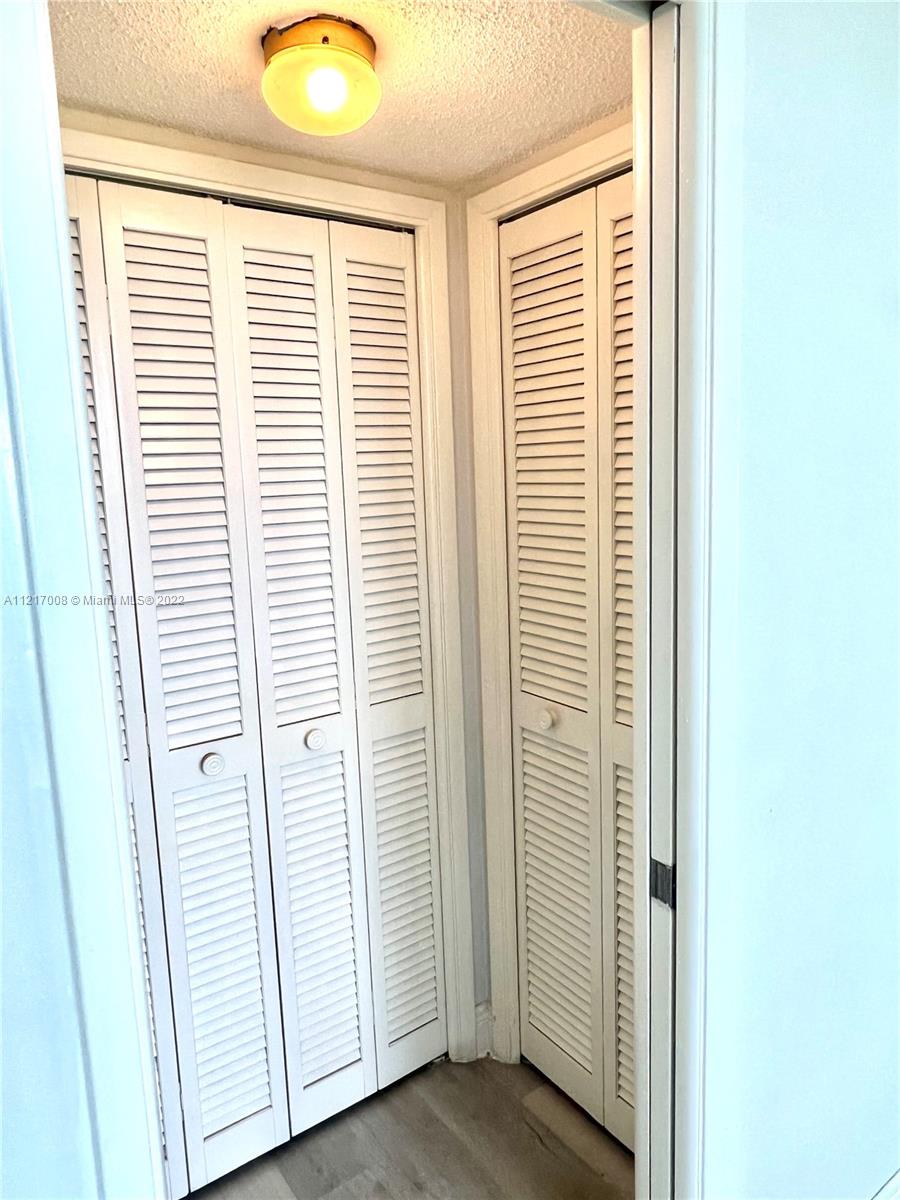 3150 North Course Lane, Unit 107 Pompano Beach, FL 33069 - Photo 13 of 24 a view of a bathroom with a window