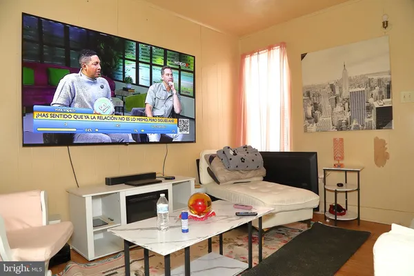 a living room with furniture and a couch