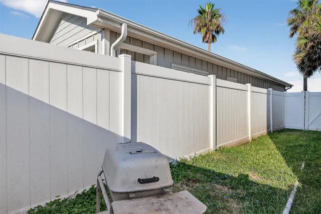 a bathroom with a granite countertop sink toilet a mirror and shower