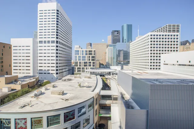 a large kitchen with a kitchen island and a stove