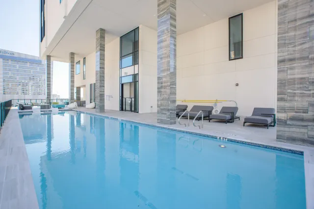 a bathroom with sink and mirror