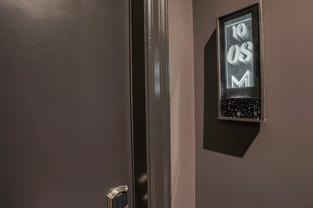 a view of a hallway with elevator