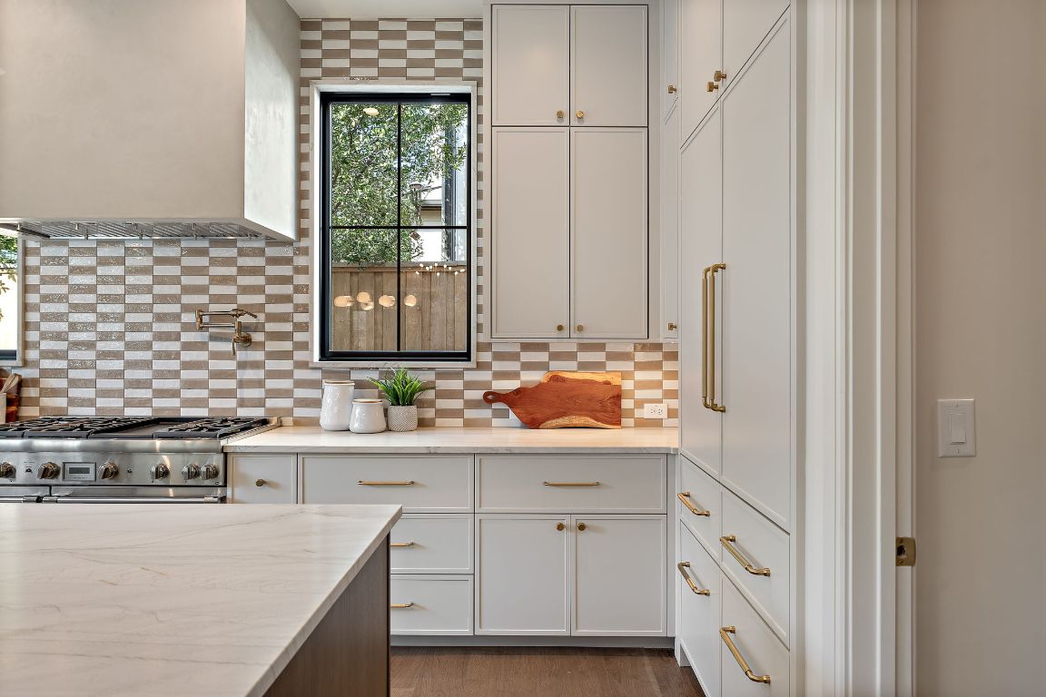 2705 Warren Street Austin, TX 78703 - Photo 12 of 39 a bathroom with a sink and a mirror