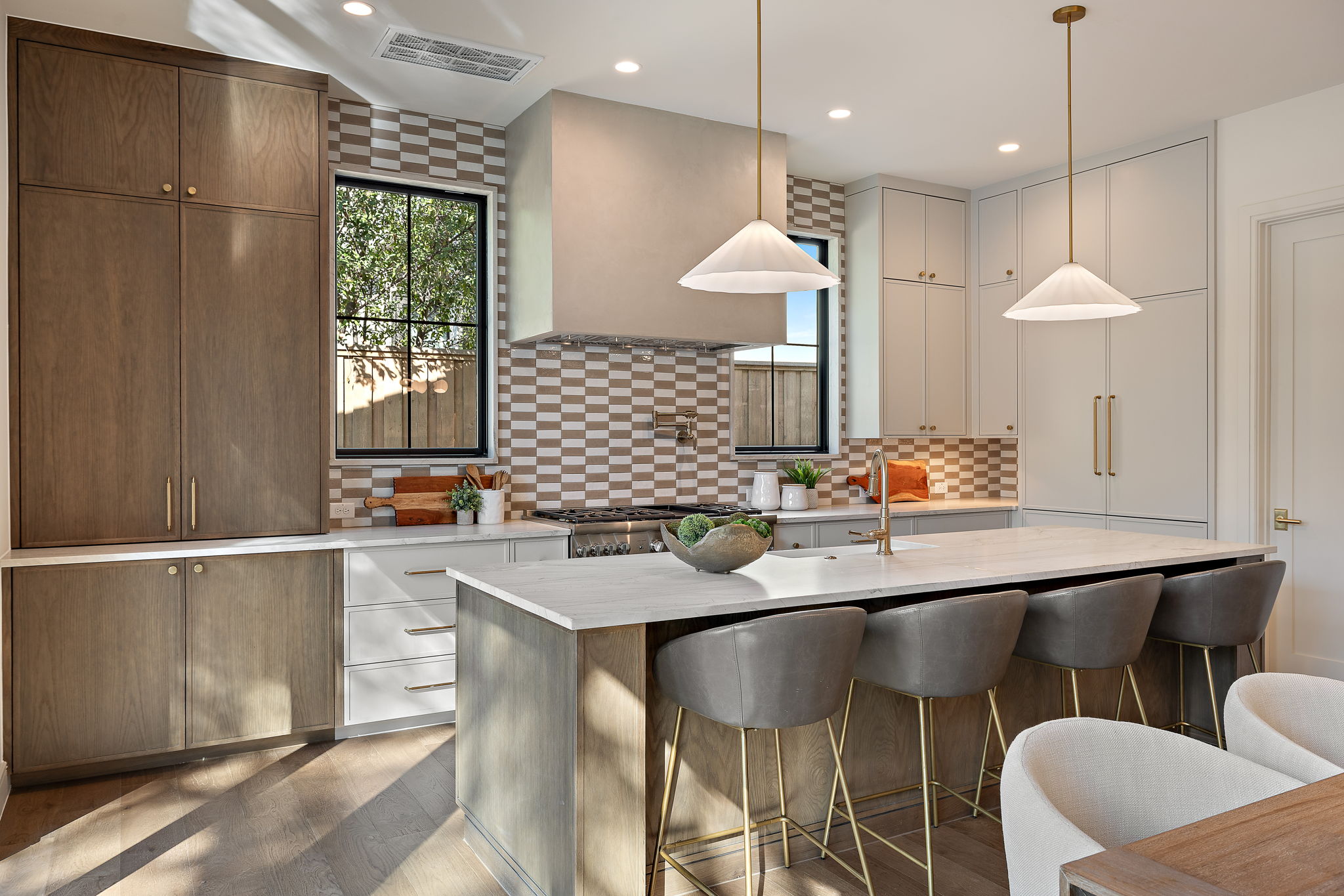 2705 Warren Street Austin, TX 78703 - Photo 16 of 39 a kitchen with a table chairs sink and cabinets
