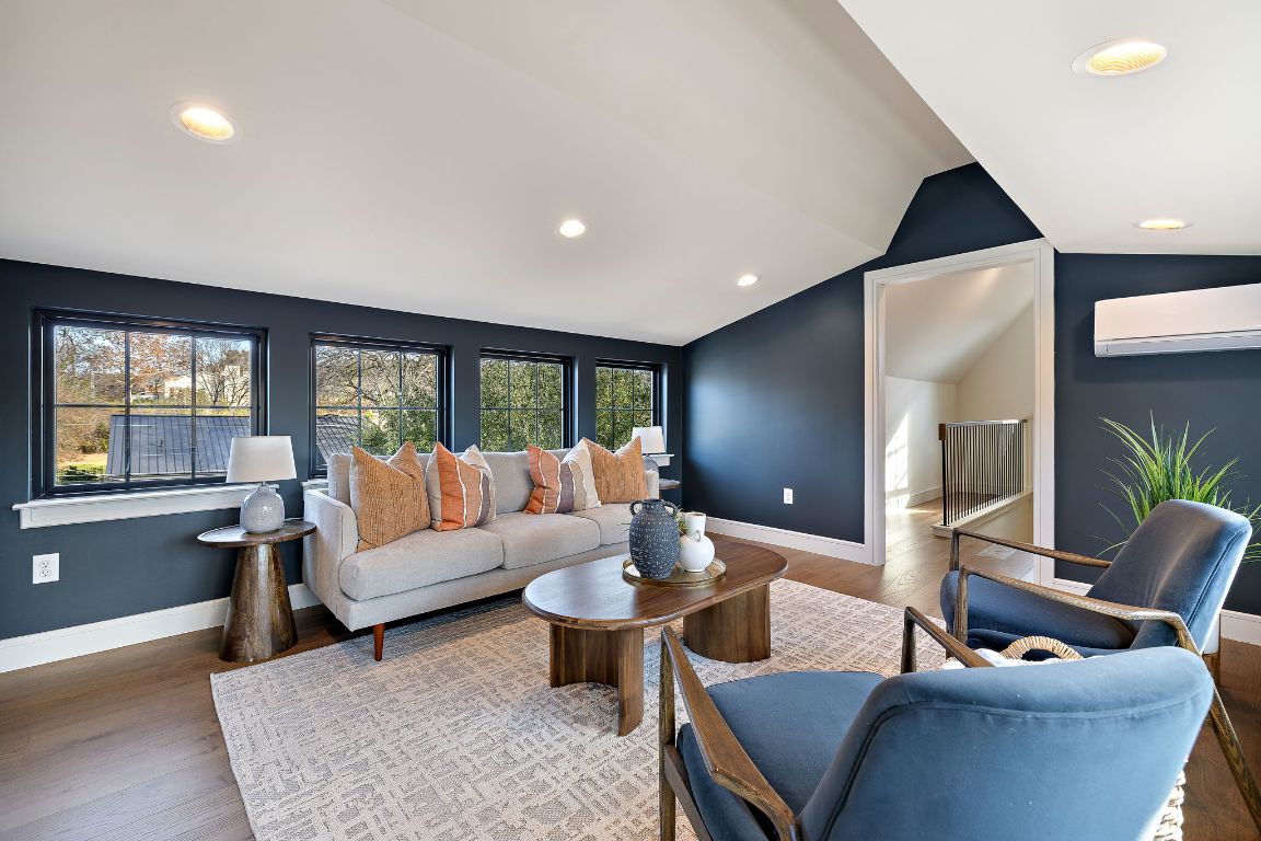 2705 Warren Street Austin, TX 78703 - Photo 30 of 39 a living room with furniture and a large window
