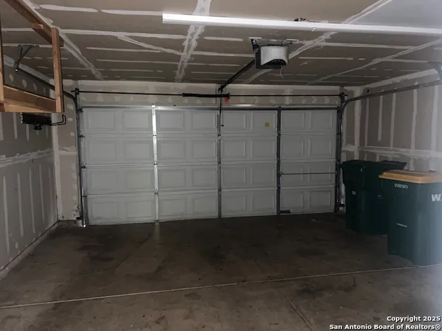 a view of wooden floor and windows in a room