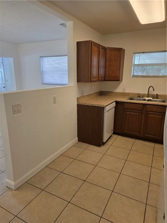 1246-1248 17th Place Vero Beach, FL 32960 - Photo 15 of 15 a kitchen with a sink a stove top oven and cabinets