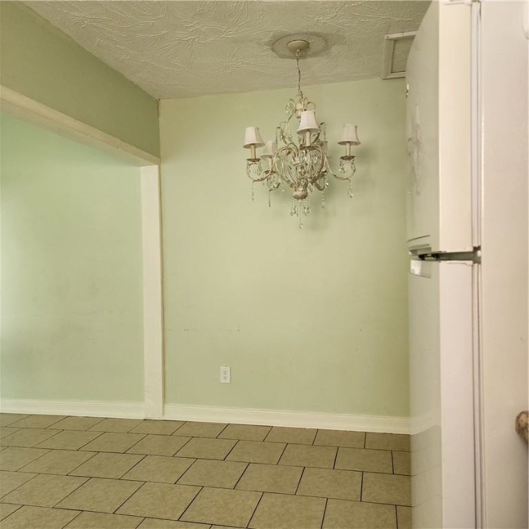 1246-1248 17th Place Vero Beach, FL 32960 - Photo 2 of 15 a view of a room with a wooden table