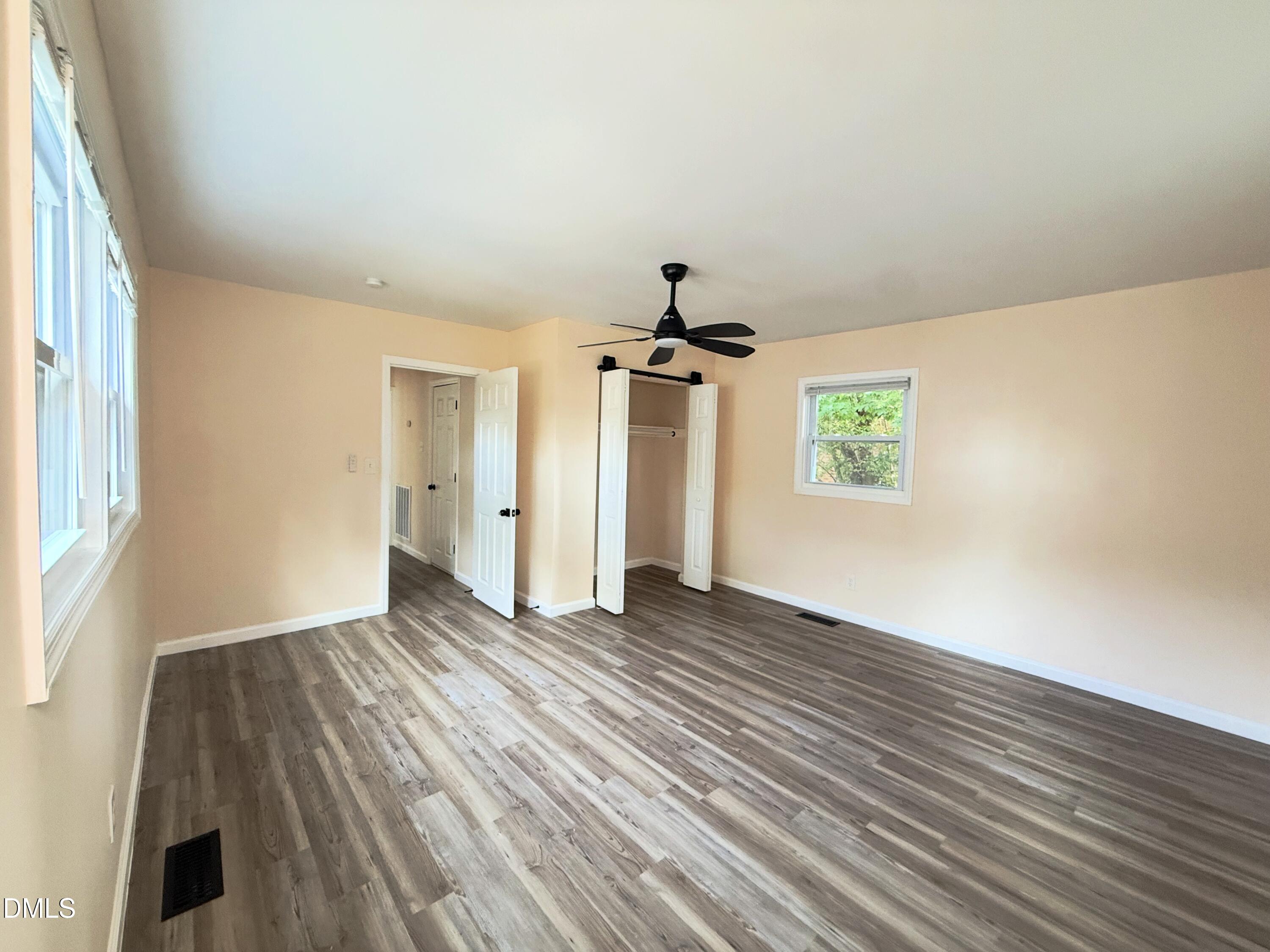 417 North Street Graham, NC 27253 - Photo 15 of 18 wooden floor in an empty room with a window