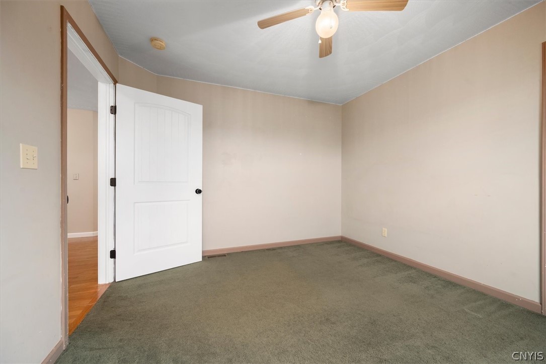 1322 Sawmill Road Sangerfield, NY 13480 - Photo 27 of 50 Smooth neutral walls and wall-to-wall carpeting define this versatile space.