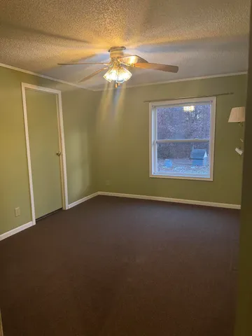 a house with trees in front of it