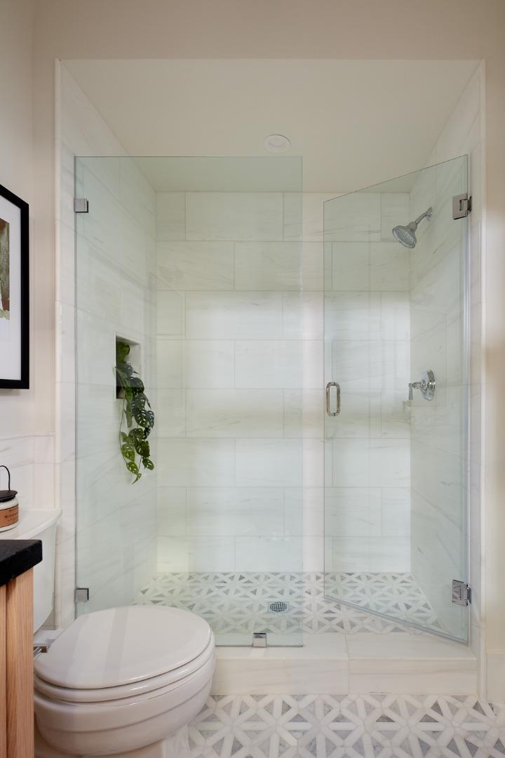 2080 Cully Place San Jose, CA 95124 - Photo 7 of 34 a bathroom with a toilet and a shower