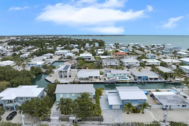 an aerial view of a city with lots of residential buildings