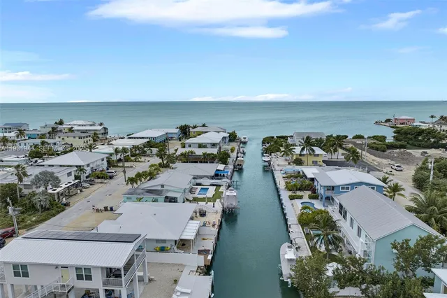 an aerial view of a city with houses