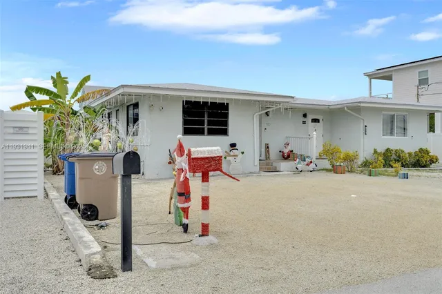 a view of a house with a garage