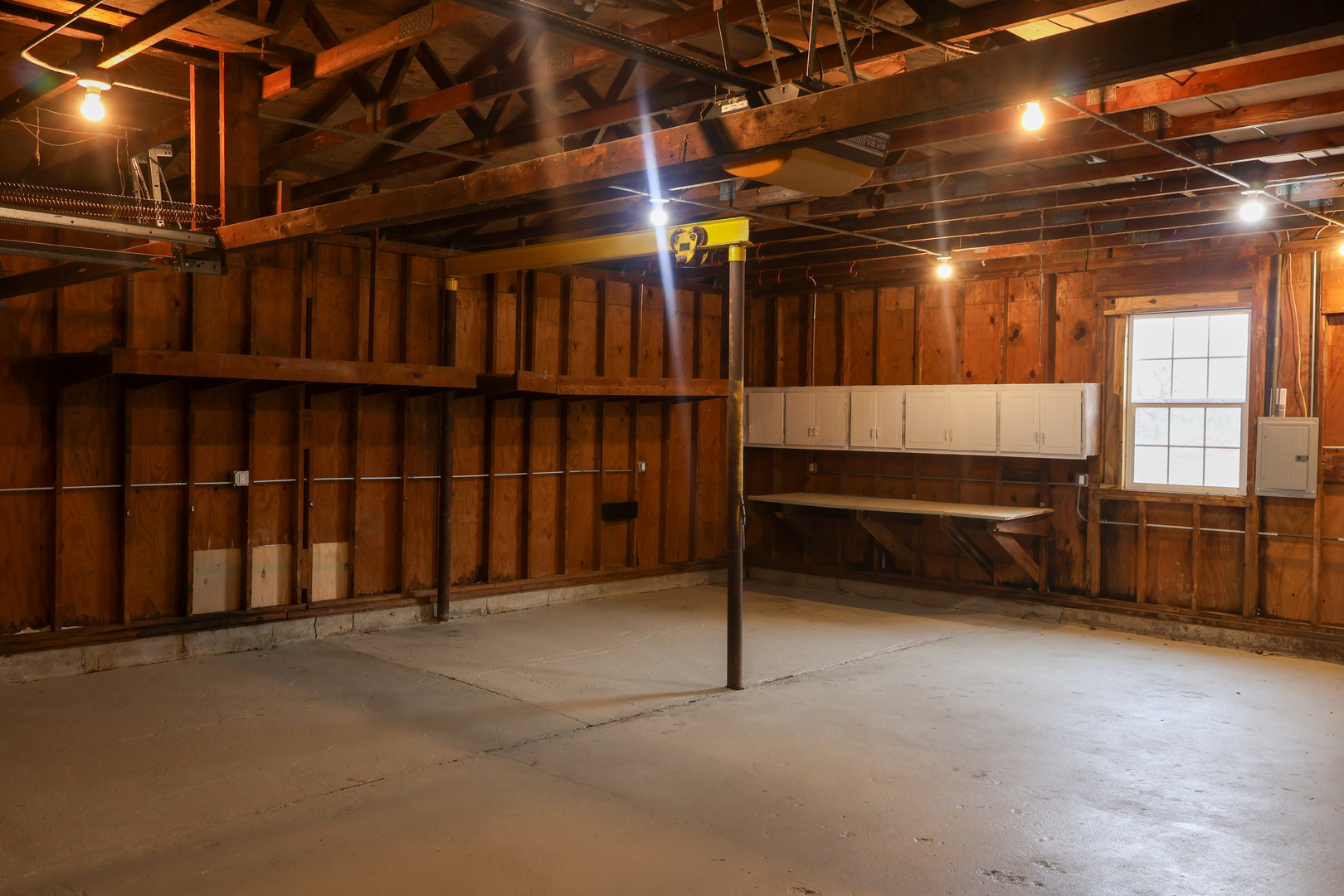 8403 Grange Hall Road Garden Prairie, IL 61038 - Photo 20 of 26 a view of an empty room with a garage