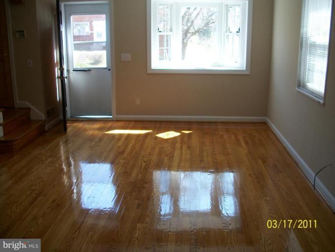 11900 Andrew Street Silver Spring, MD 20902 - Photo 2 of 12 The wood floors in this home look fantastic!