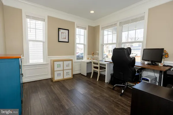 a view of a dining room with furniture and toys