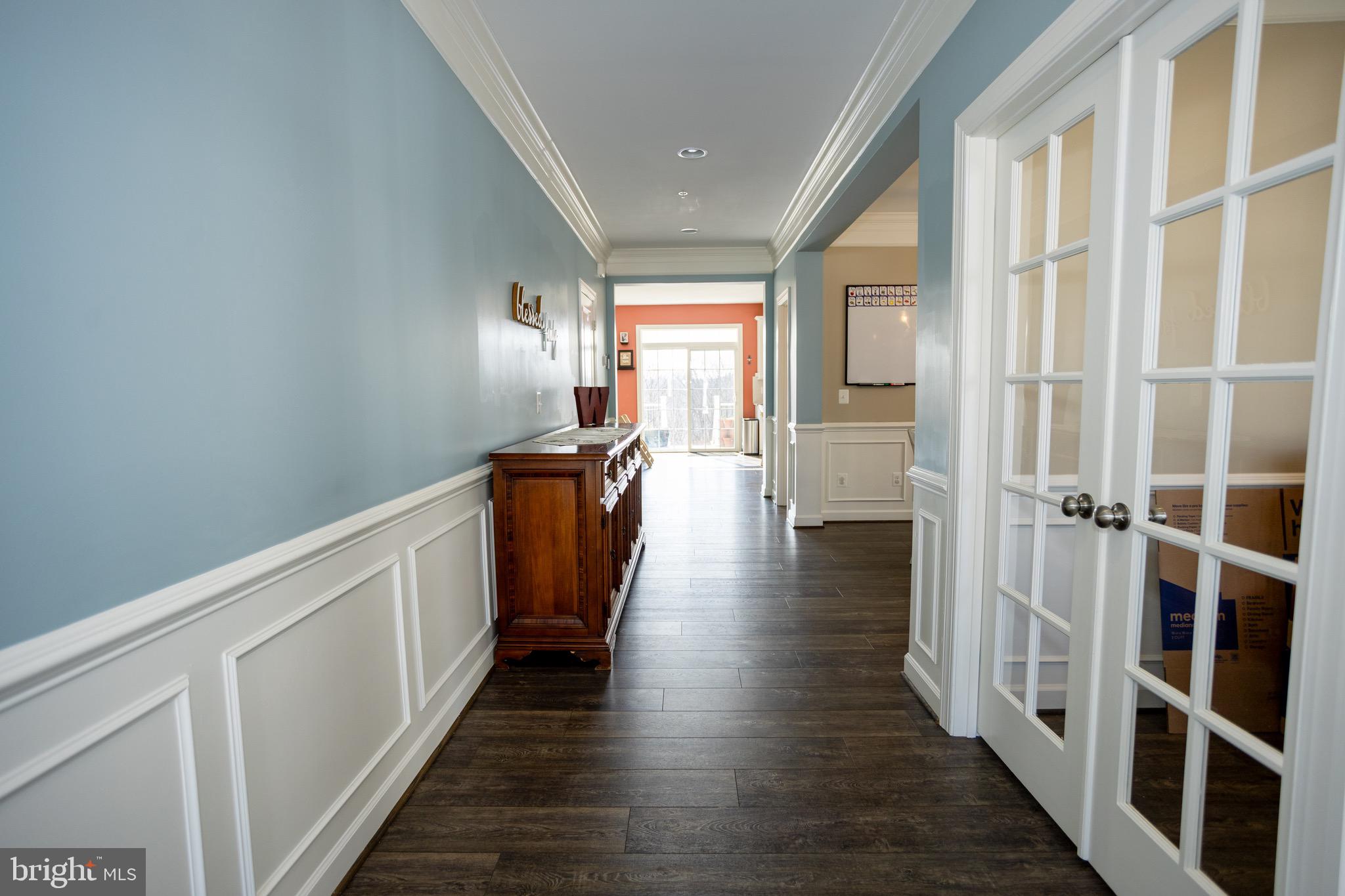2425 Morgans Point Drive Dumfries, VA 22026 - Photo 20 of 99 a hallway with wooden floor windows and stairs