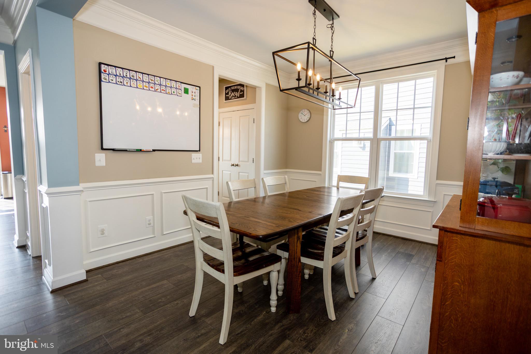 2425 Morgans Point Drive Dumfries, VA 22026 - Photo 23 of 99 a view of a dining room with furniture window and wooden floor