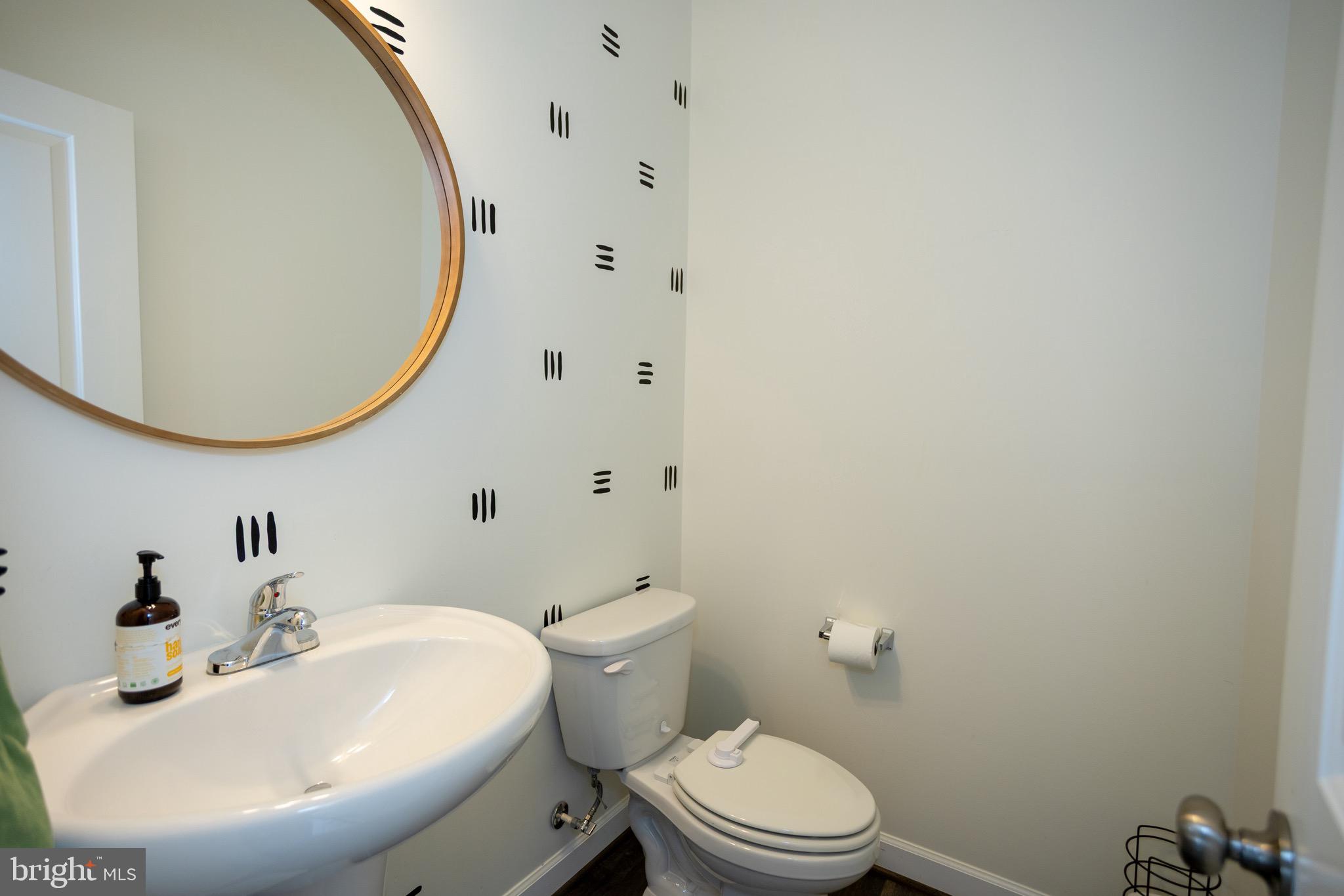 2425 Morgans Point Drive Dumfries, VA 22026 - Photo 25 of 99 a bathroom with a sink and a mirror