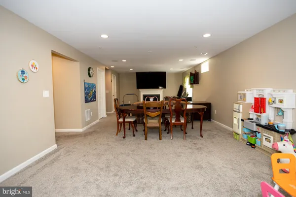 a dining room with furniture window wooden floor