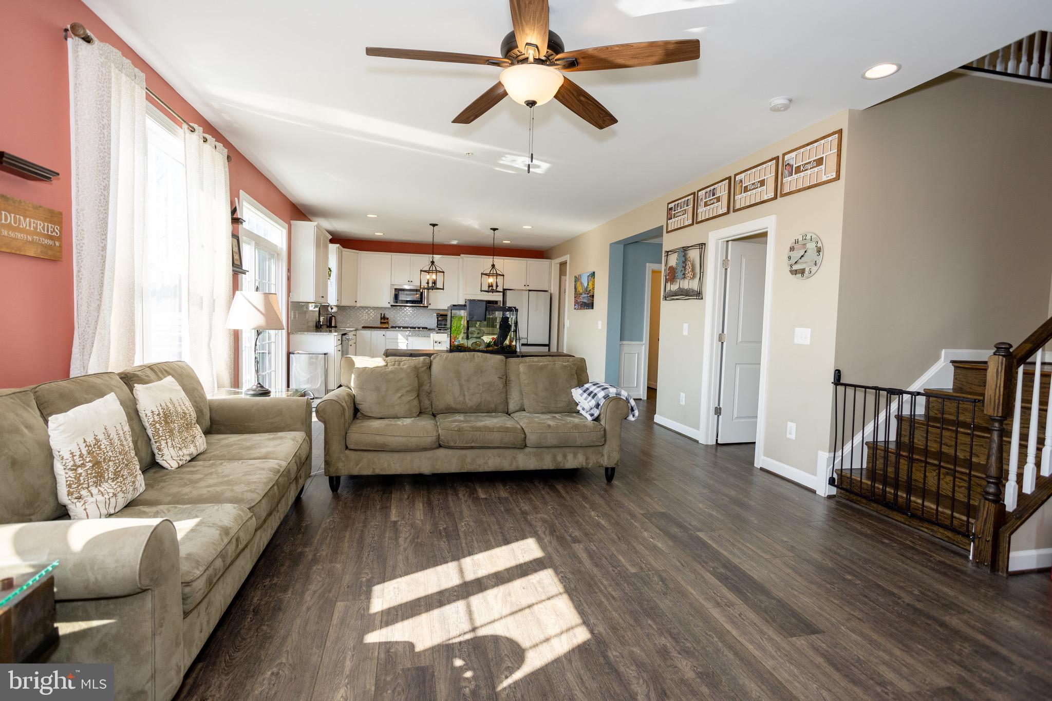 2425 Morgans Point Drive Dumfries, VA 22026 - Photo 26 of 99 a living room with furniture and a large window