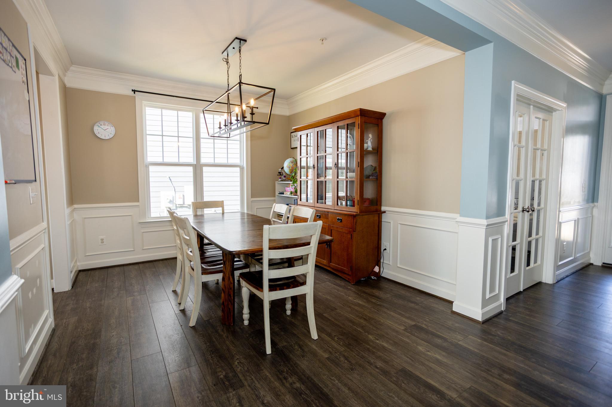 2425 Morgans Point Drive Dumfries, VA 22026 - Photo 38 of 99 a dining room with furniture window wooden floor