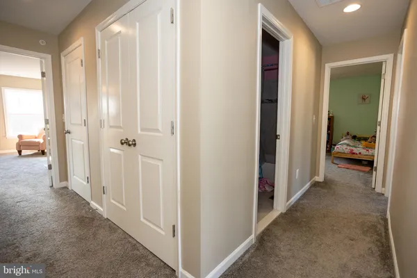 a bed room with a bed and a window