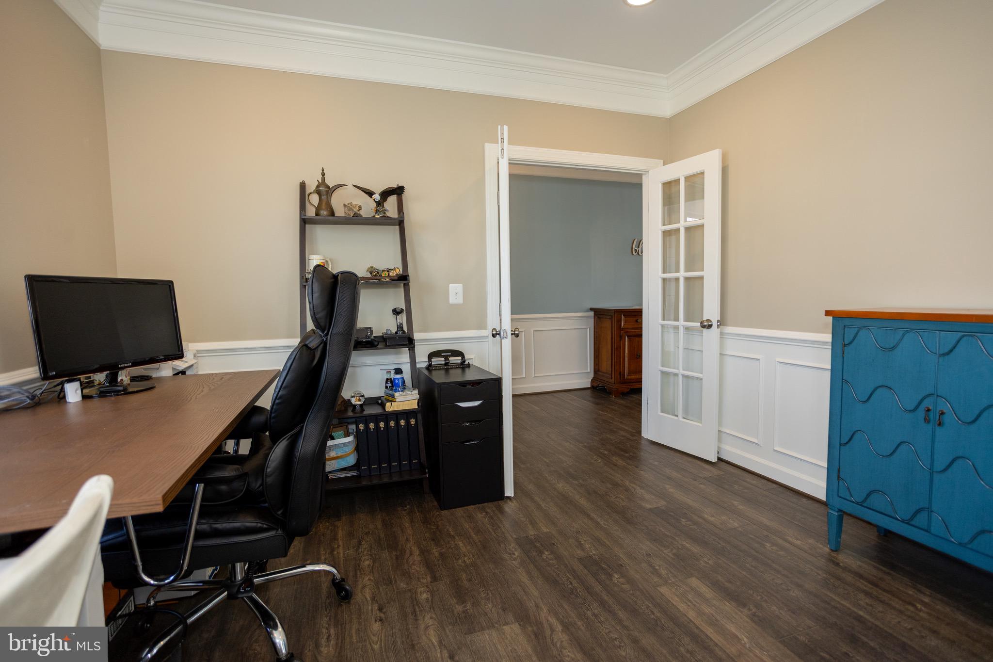 2425 Morgans Point Drive Dumfries, VA 22026 - Photo 40 of 99 a view of a workspace with furniture and wooden floor