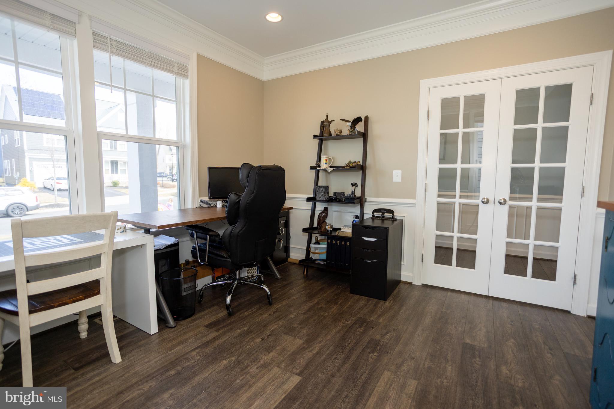 2425 Morgans Point Drive Dumfries, VA 22026 - Photo 5 of 99 a view of a workspace with furniture and a window