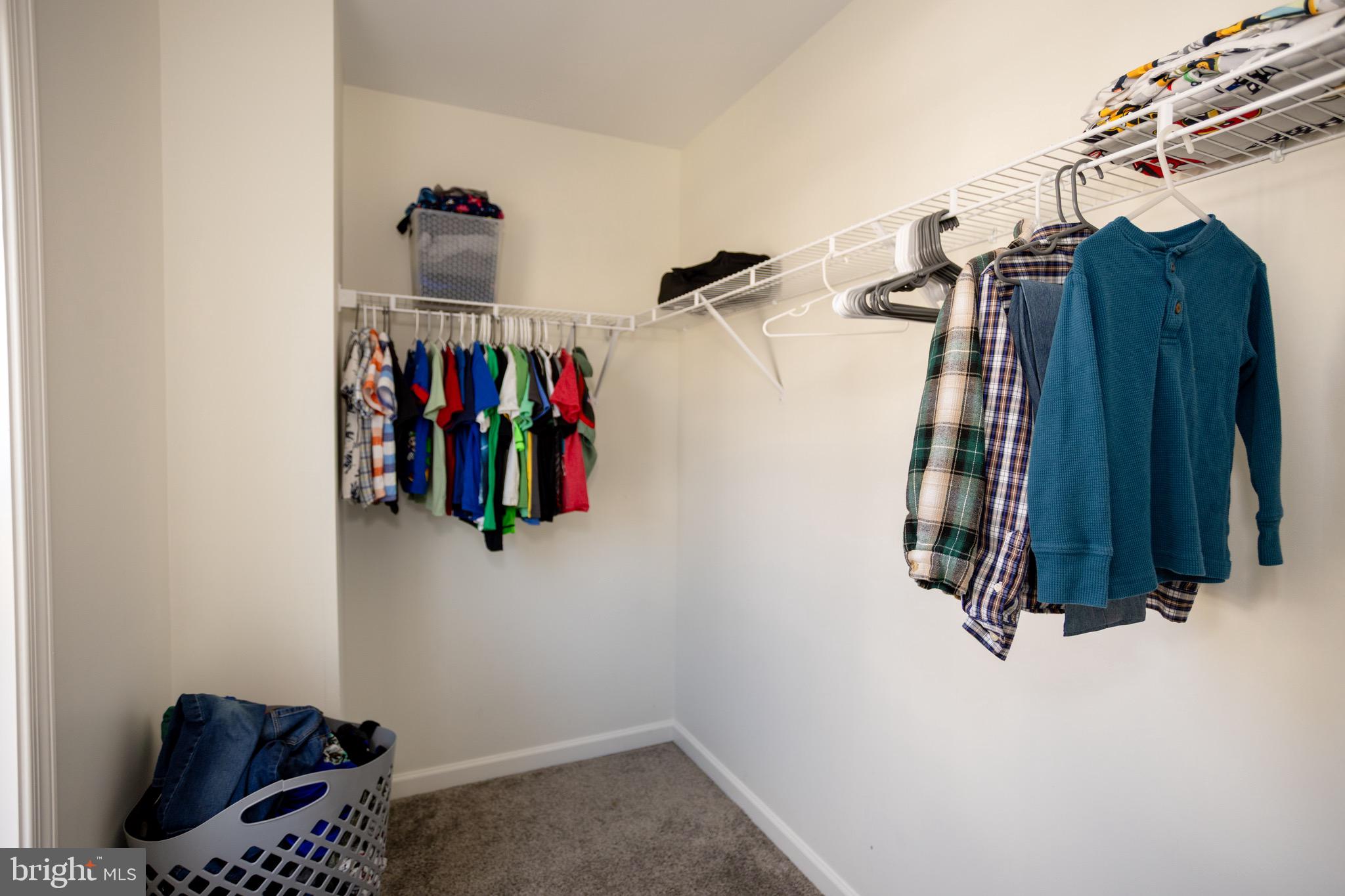 2425 Morgans Point Drive Dumfries, VA 22026 - Photo 58 of 99 a view of walk in closet with clothes