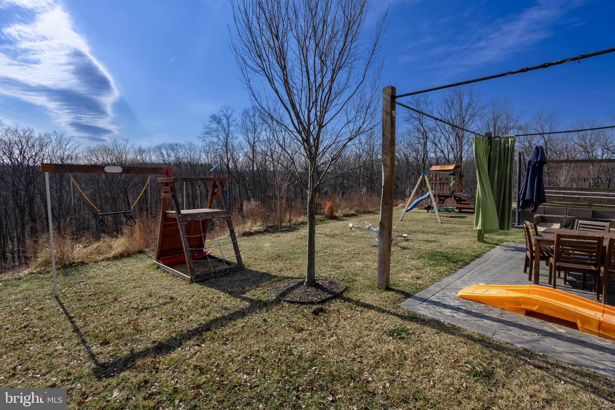 2425 Morgans Point Drive Dumfries, VA 22026 - Photo 70 of 99 a view of a backyard with wooden fence