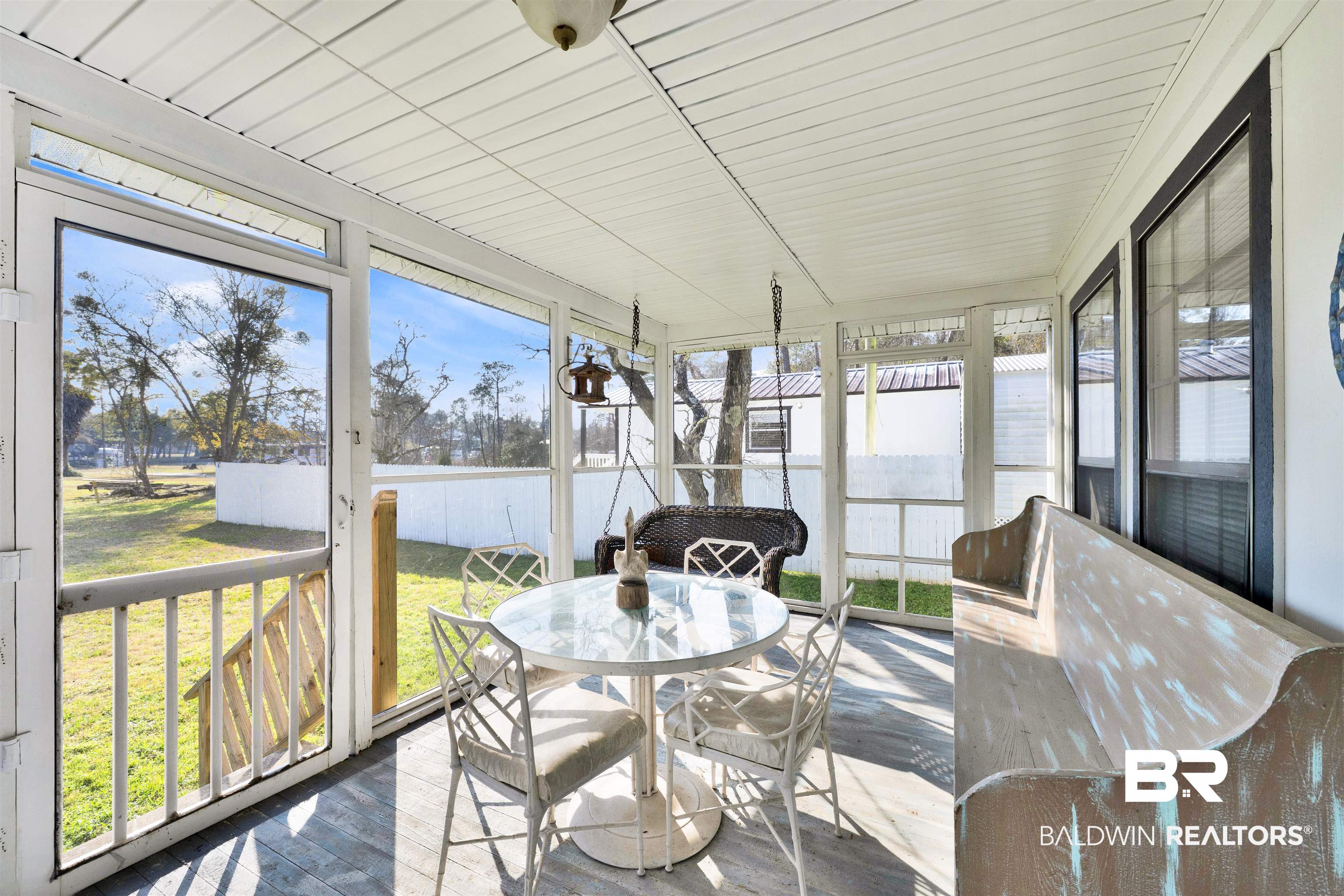23770 Miflin Road Elberta, AL 36530 - Photo 18 of 38 Sunroom / solarium with plenty of natural light and outdoor dining space