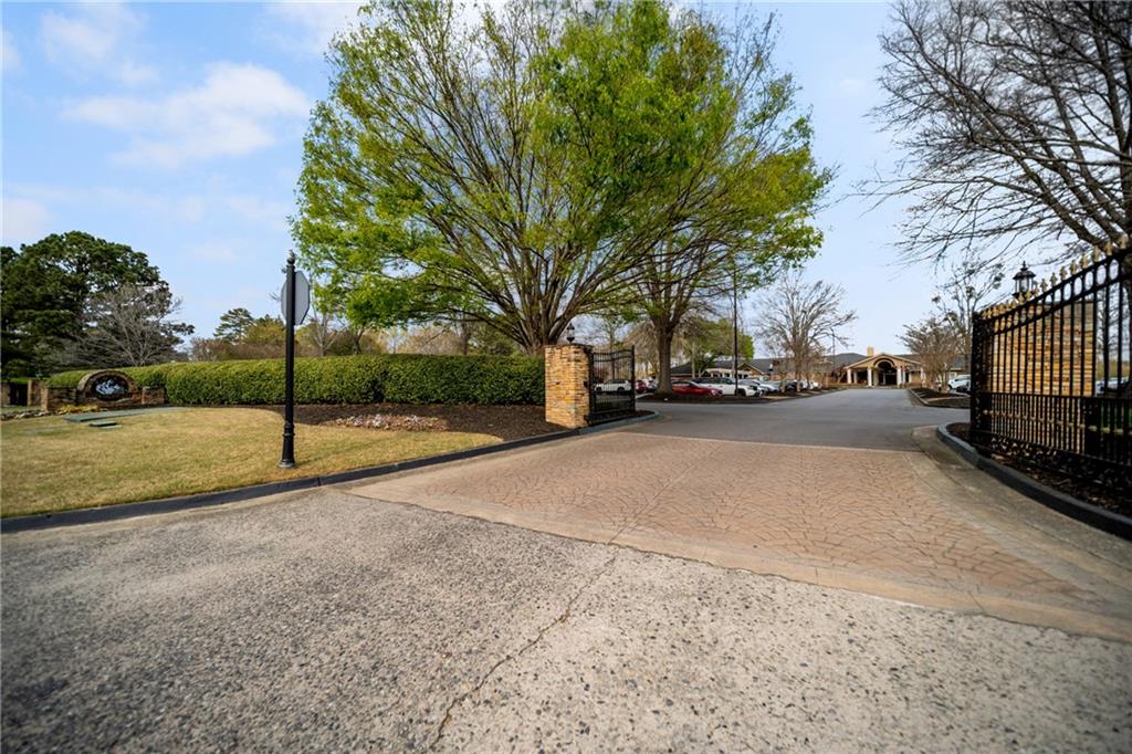 7105 Sheffield Place Cumming, GA 30040 - Photo 70 of 73 a view of street with parked cars
