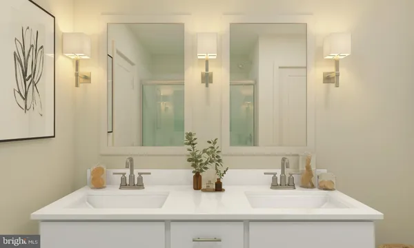 a bathroom with double sink and a mirror