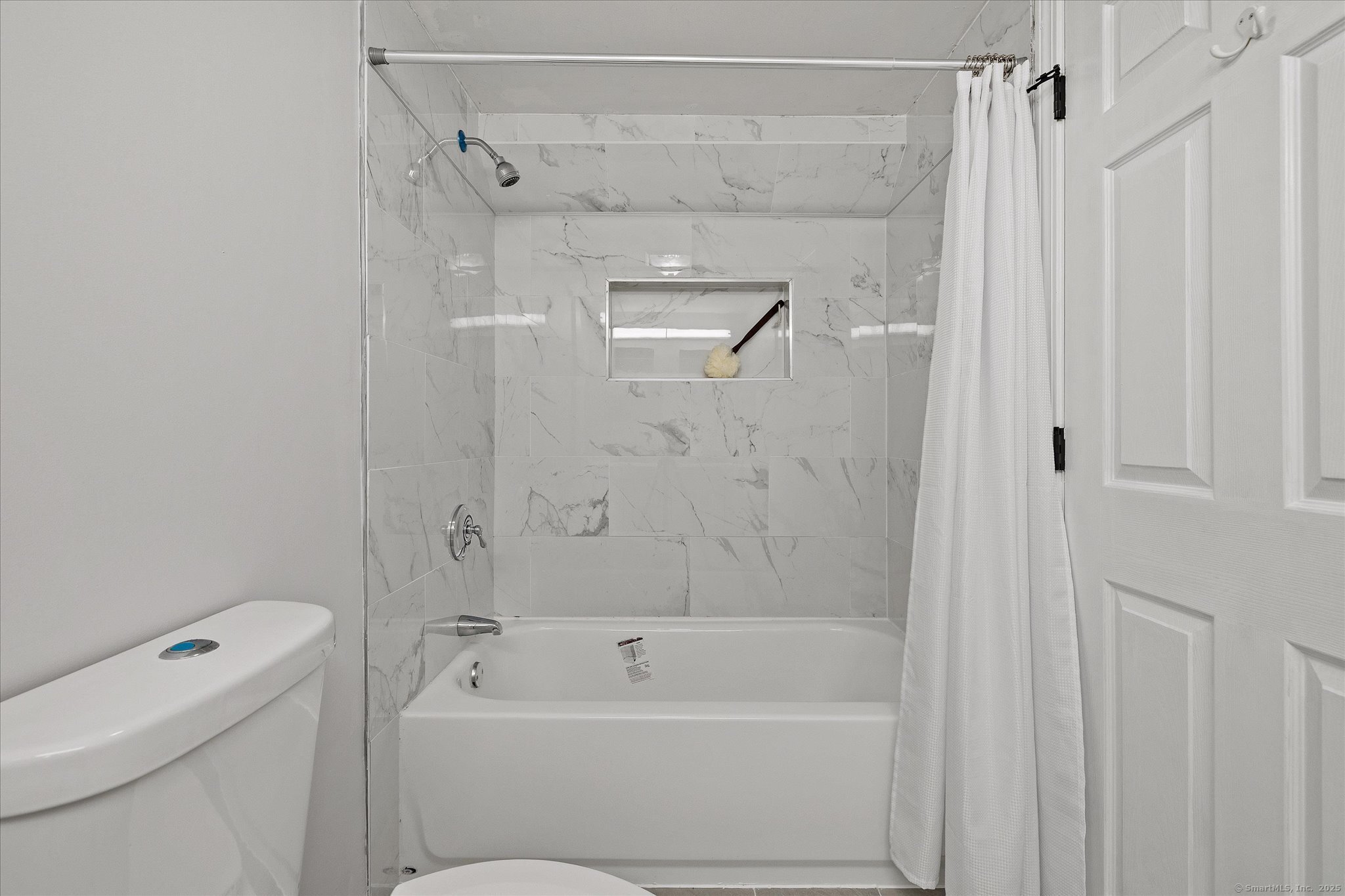 34 Pleasant Street, Unit 5 Plainfield, CT 06374 - Photo 11 of 24 a bathroom with a shower a toilet and a shower