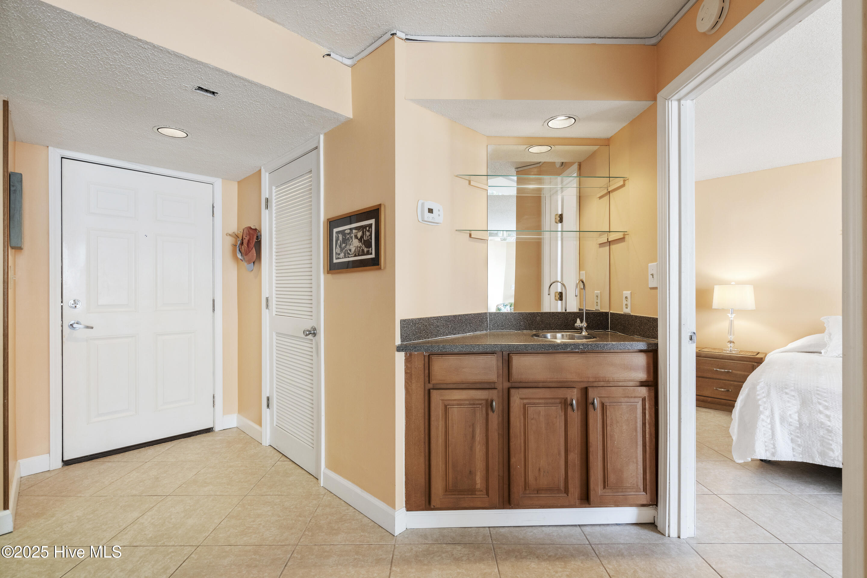 2000 New River Inlet Road, Unit 2304 North Topsail Beach, NC 28460 - Photo 16 of 40 Entry,Laundry, and Wet Bar