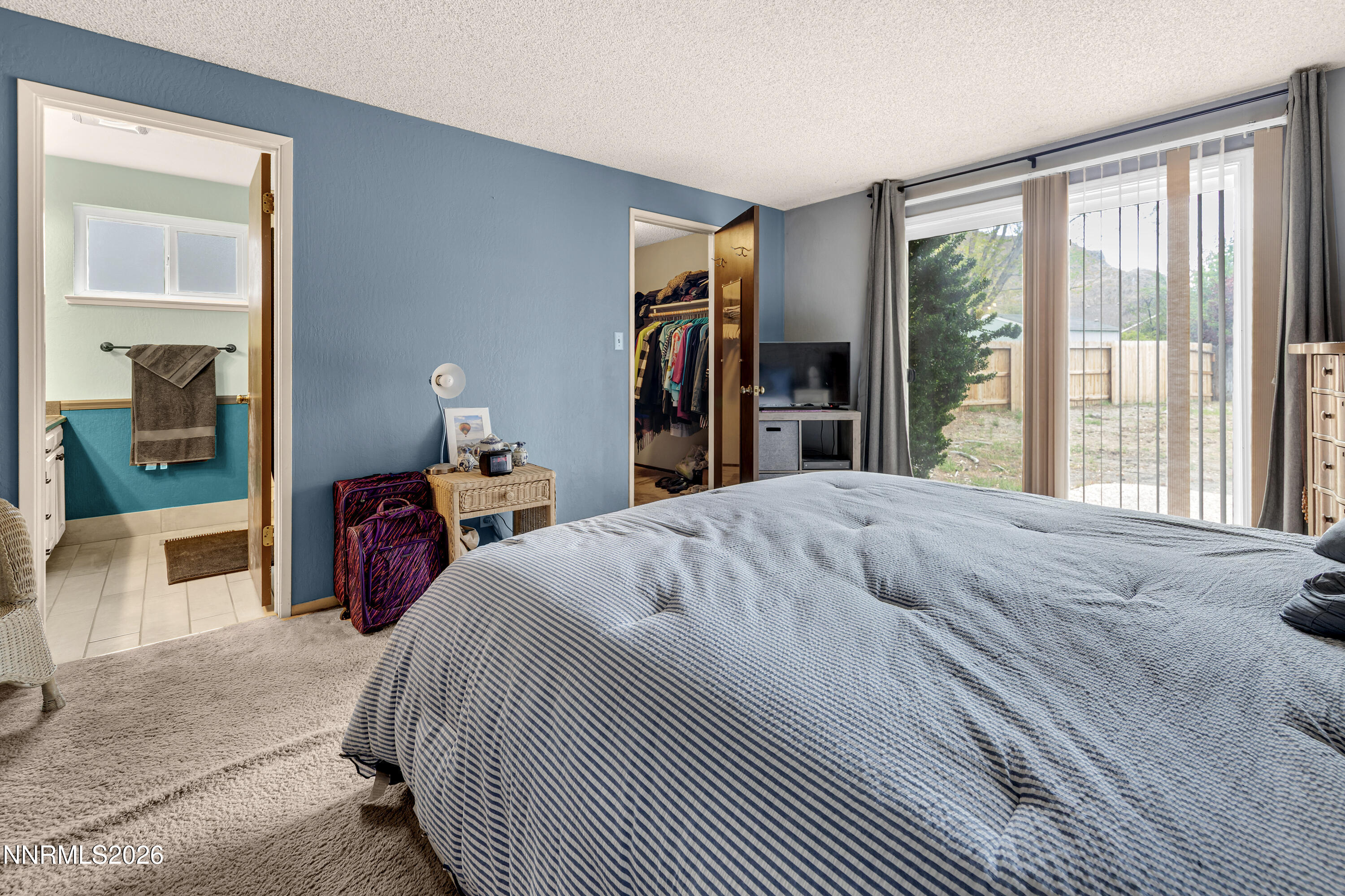 4455 Matich Drive Reno, NV 89502 - Photo 16 of 28 Primary bedroom into bathroom
