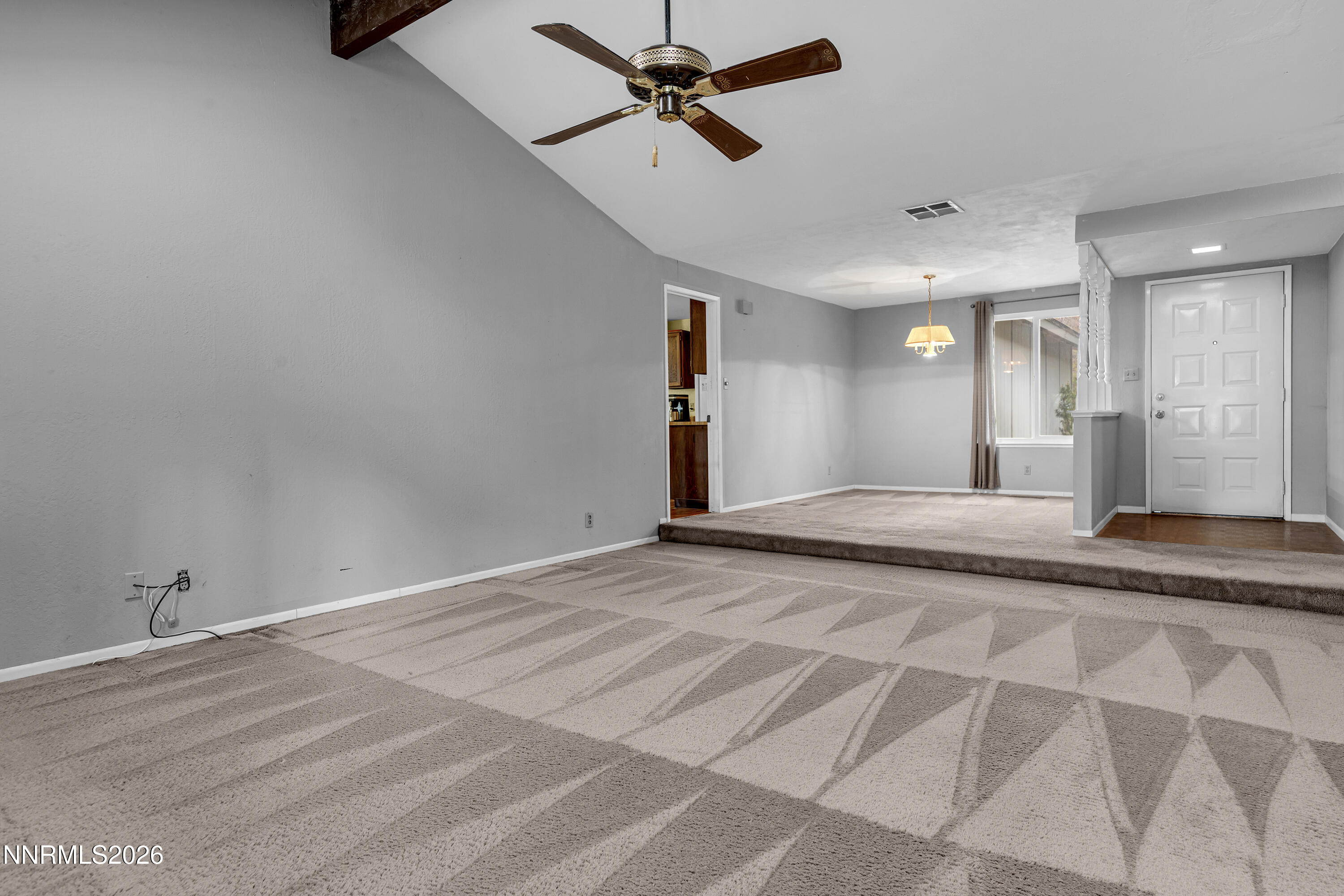4455 Matich Drive Reno, NV 89502 - Photo 7 of 28 Entryway, living room and dining room