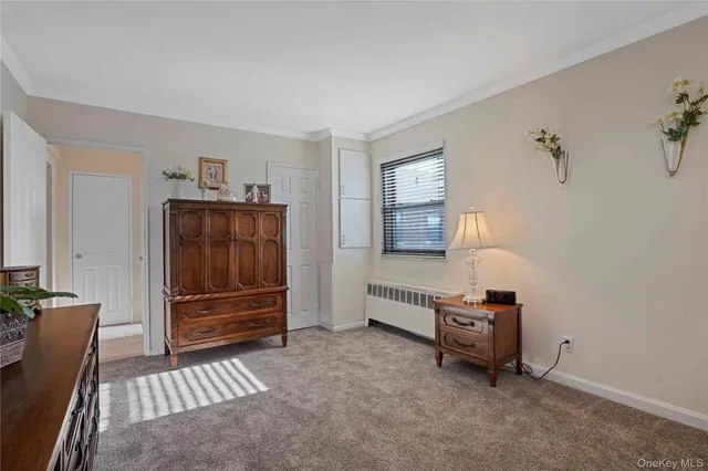 a room with furniture and a window