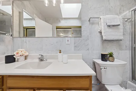 an aerial view of a building with parking space