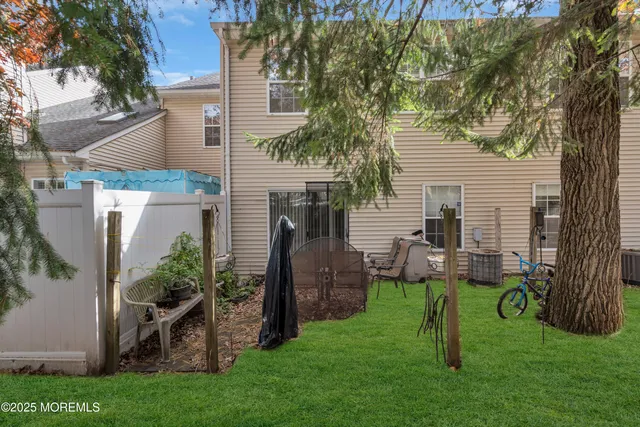 a view of backyard with a garden and plants