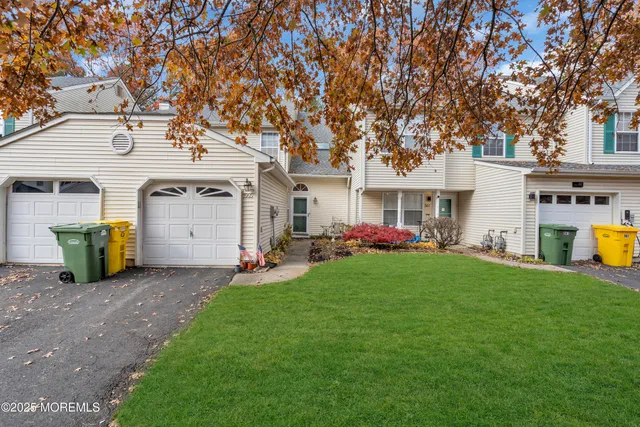 a view of a house with a back yard