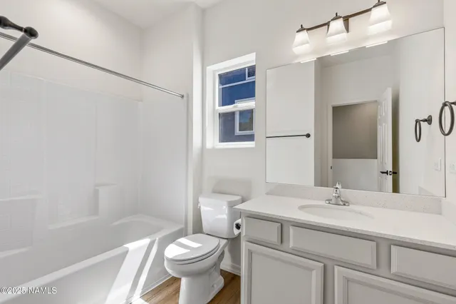 front view of a house with a small yard