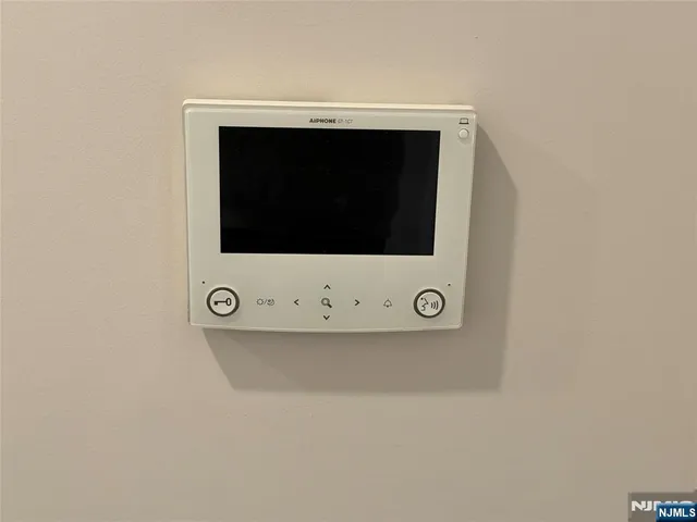 a view of an entryway with a floor to ceiling window