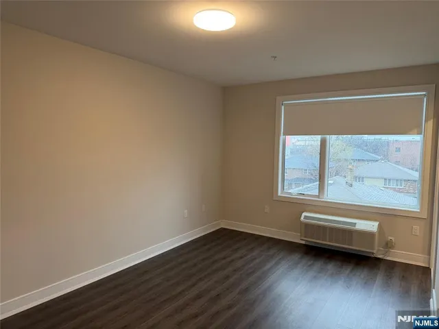 a view of a hardwood floor in a room
