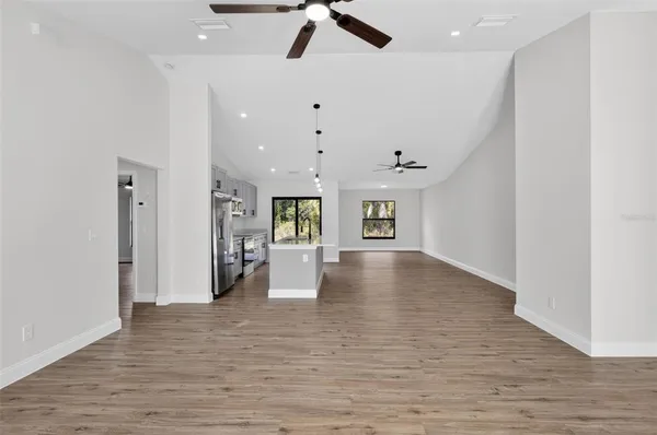 a view of cabinets and wooden floor