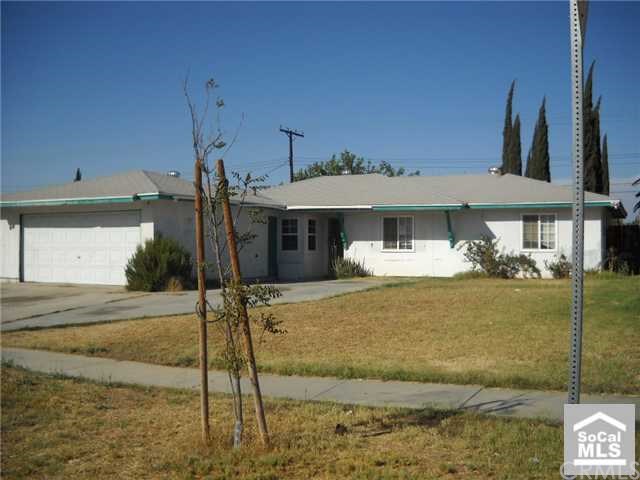 4909 Challen Avenue Riverside, CA 92503 - Photo 1 of 1 a front view of a house with garden