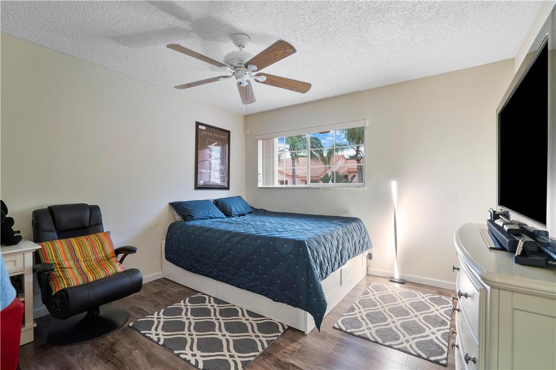 17262 Boca Club Boulevard, Unit 2403 Boca Raton, FL 33487 - Photo 11 of 27 Bedroom #2 with lament flooring